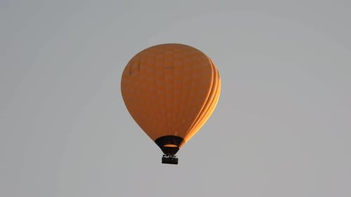 Hot Air Balloon Ascending at Sunset