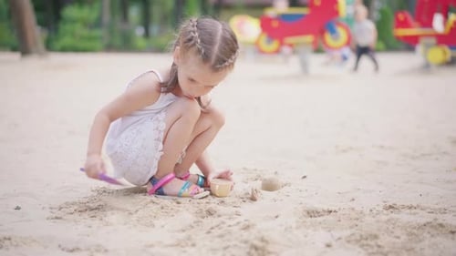 Little Girl Playing Sandbox Playground Digging Sand Shovel Building Sand Figure Summer Day