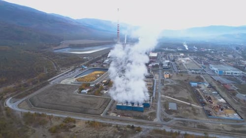 Aerial View of Metallurgical Plant Factory with Smoke Coming Out of Factory Pipes