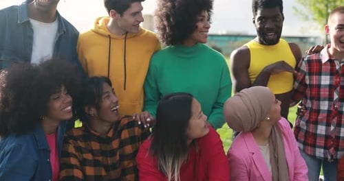 Young diverse people having fun outdoor laughing together - Diversity concept