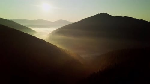 Mountain Peaks and Morning Sky with Smooth Moving Clouds