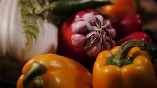 Fresh Vegetables: Colorful Peppers, Garlic, and Cabbage