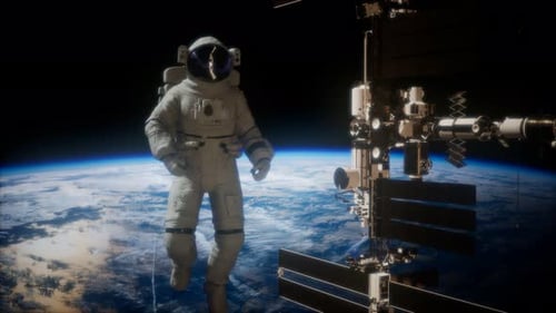 International Space Station and Astronaut in Outer Space Over the Planet Earth