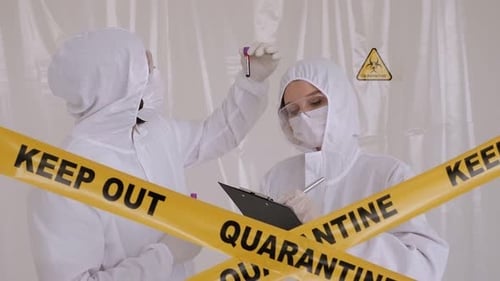 Researchers Analyze Test Tubes in Quarantine Lab