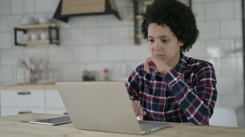 Upset African American Woman Get Shocked on Laptop