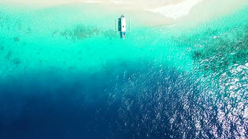 Daytime fly over clean view of a sunshine white sandy paradise beach and blue water background in hi