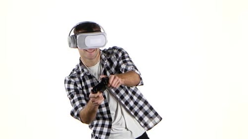 Enthusiastic Man Plays Virtual Reality Game with Controller