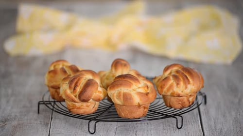 Golden Brioche Buns on Rack, Close Up Shot