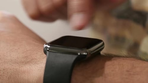 Close Up of Man Using Smartwatch