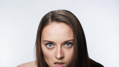 Aggressive Beautiful Crazy Girl Look at Camera Face Sight Close Up Background
