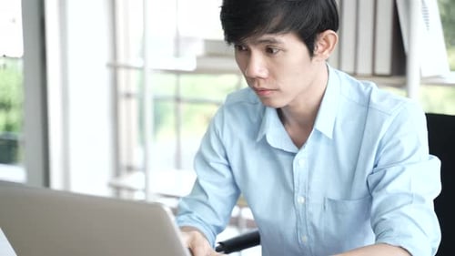 businessman typing a computer keyboard, working at the office or work from home, online work