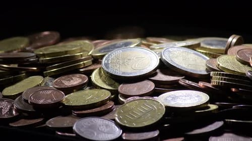 Mountain with Different Euro Coins Turning
