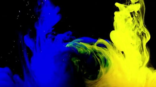Abstract Blue and Yellow Ink Mixing Together