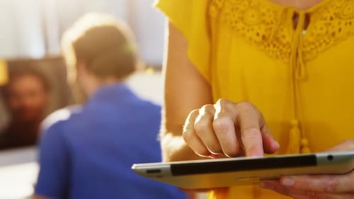 Business executive using digital tablet