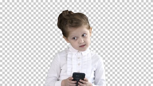 Cute Little Girl Looks in Smartphone And, Alpha Channel