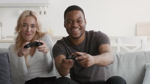 Friends Having Fun Playing Video Games Together