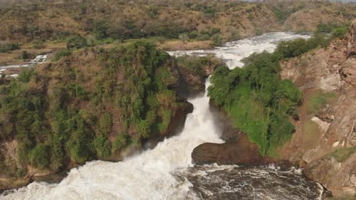 Aerial drone shot of Murchison Falls National Park. Big falls in the middle of a jungle in Africa. U