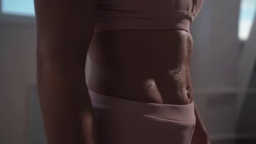 Sweaty Abs After Intense Workout, Female Torso