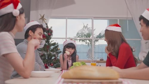 Family Christmas Meal Celebration With Festive Cheer