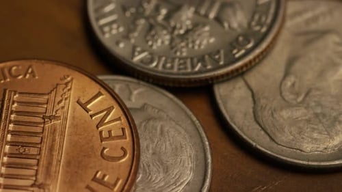 Rotating stock footage shot of American monetary coins - MONEY 0319