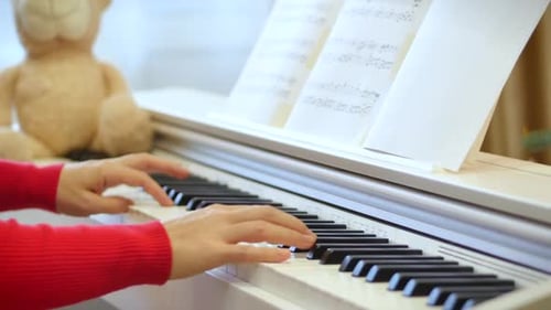 Woman Plays Beautiful Piano Music at Home