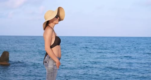 Woman Admires Ocean View
