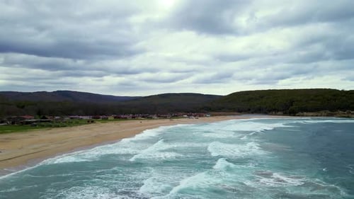 High and powerful waves coming fast to the beach, waves in winter day