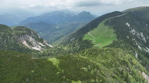 Flying over the summer mountains and hills