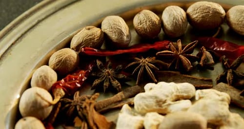 Selection of Spices Arranged on a Metallic Plate