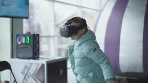 Child Engrossed in Virtual Reality Experience