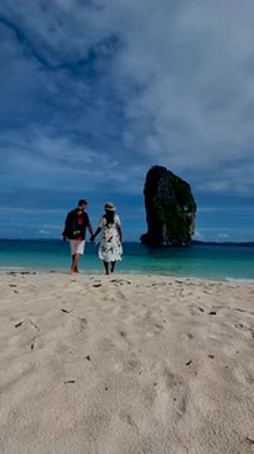Koh Poda Krabi Thailand Asian Woman and European Men Walking on the Tropical Beach of Koh Poda