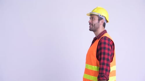 Profile View of Happy Bearded Persian Man Construction Worker Smiling