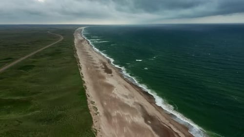 Drone Over Grass And Sandy Beach Of Jutland Coastline With Horizon
