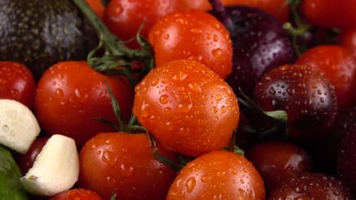 Fresh Vegetables: Tomatoes, Cucumbers, Garlic, Onion, Avocado
