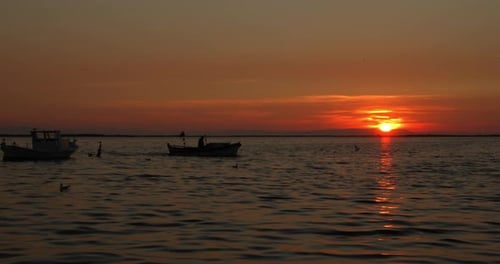 Wooden Fishing Boat Returning From Fishing At Sunset