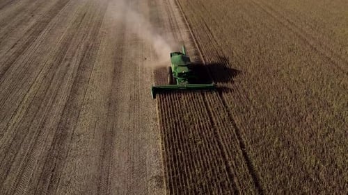 Combine Harvester Working in Agricultural Field, Aerial