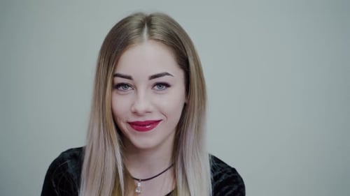 Attractive Young Adult with a Slight Smile