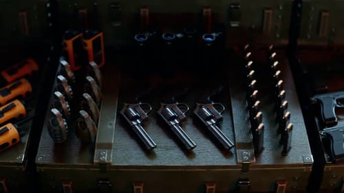 Military Tactical Gear and Weapons in Open Storage Case