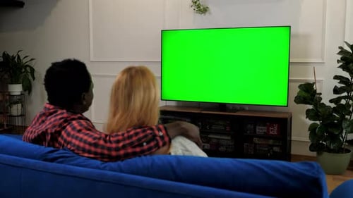 Green Screen TV Multiethnic Family Couple Embrace Watching Movie Series on TV