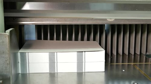 Industrial process of making envelopes in a factory