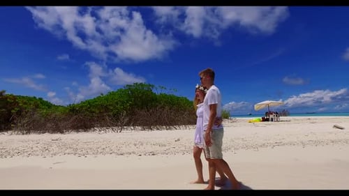 Man and lady tanning on perfect sea view beach voyage by blue green water and clean sandy background