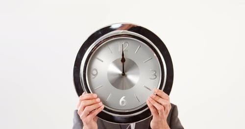 Man holding clock
