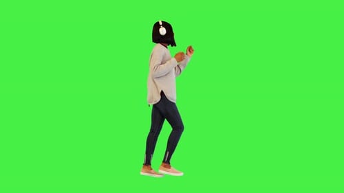 Woman Walking and Dancing with Headphones on Green Screen