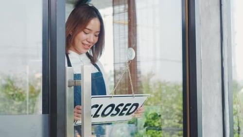 Female owner of coffee shop opening the service after lockdown quarantine