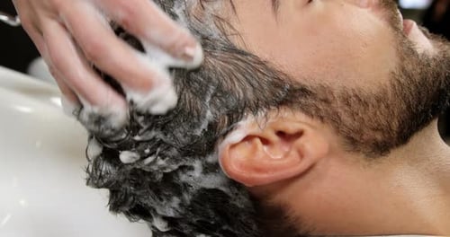 Man getting his hair wash