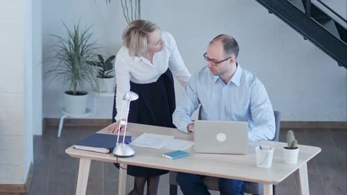 Business People Having Meeting Around Table in Modern Office