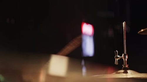 Drummer Hitting Cymbal with Drumsticks Close Up