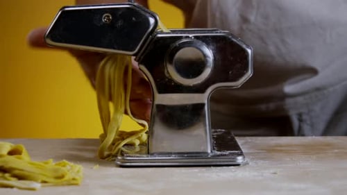 Fresh Pasta Pulled Through Gleaming Pasta Machine