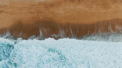 Seascape with Ocean Waves Rolling on Empty Beach Upper View
