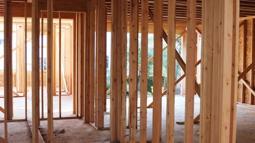 Open in industrial unfinished wood frame building or a house under construction